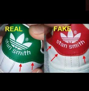 how tell if adidas wind breaker is fake|adidas counterfeit or real.